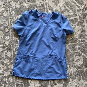 Urbane performance scrub top